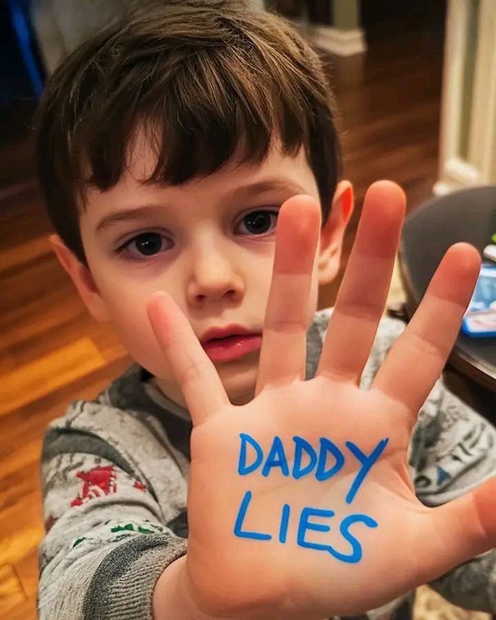 My son quietly held up his palm and gestured toward my husband’s briefcase.