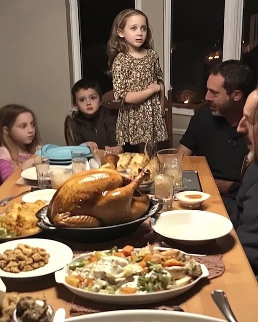 At Thanksgiving dinner, my daughter suddenly stood up and shouted..