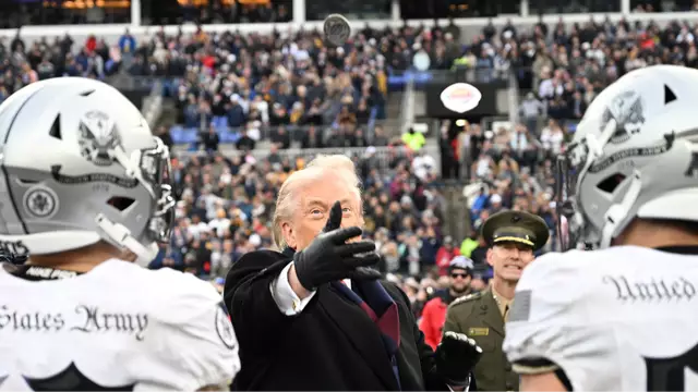 Fans are saying the same thing after Trump ‘fumbles’ coin toss at football game